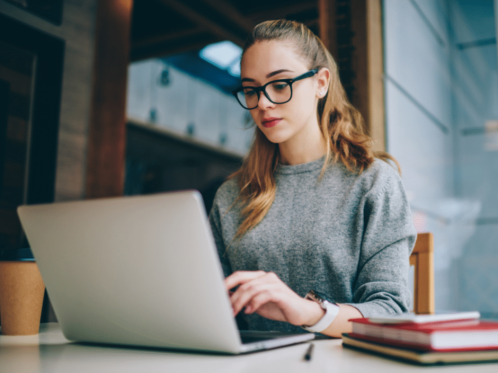 Woman on a laptop using an adaptive learning system
